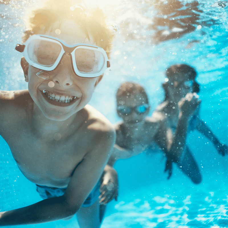 kids swimming underwater