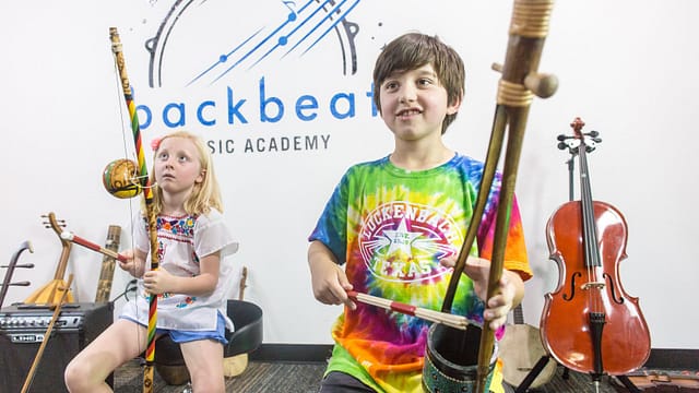 Backbeat-music-Try-Everything-class-three-8-year-old-boys-are-playing-unusual-instruments