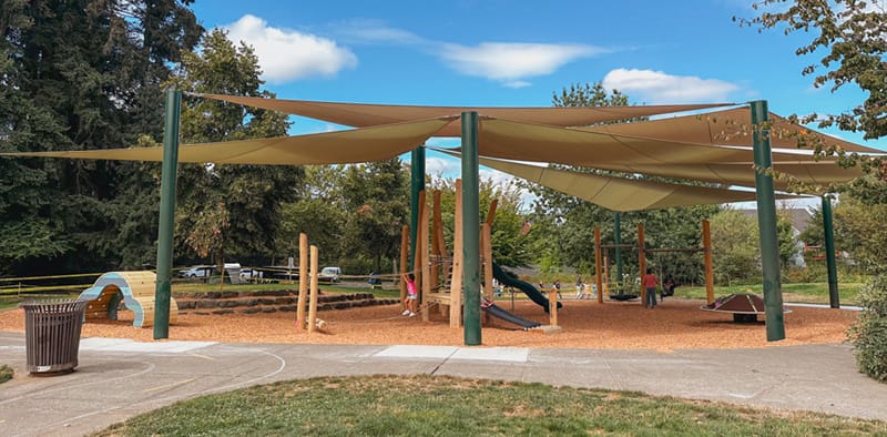 playground in hillsboro covered by fabric sun shades