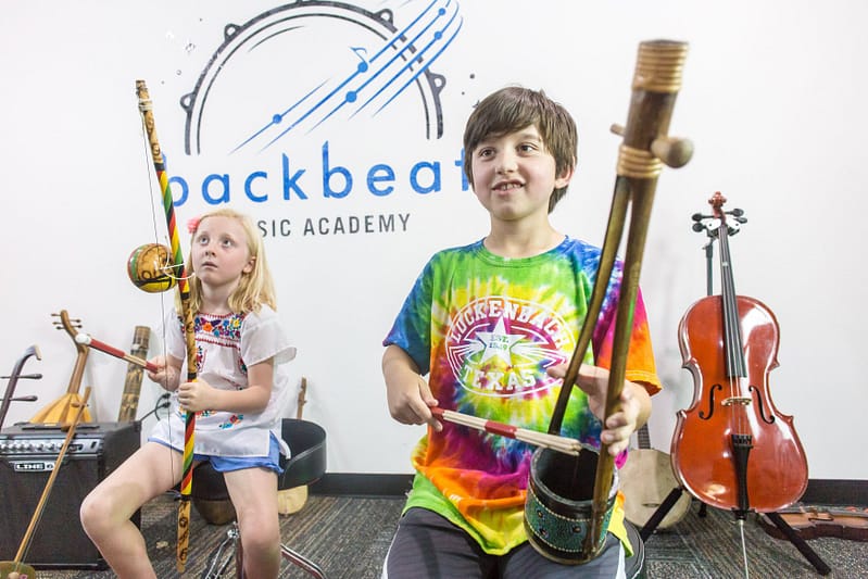 Backbeat-music-Try-Everything-class-three-8-year-old-boys-are-playing-unusual-instruments